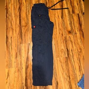 Small dickies pants, I believe they are men’s but the tag is worn